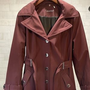 Calvin Klein trench/raincoat with hood.
